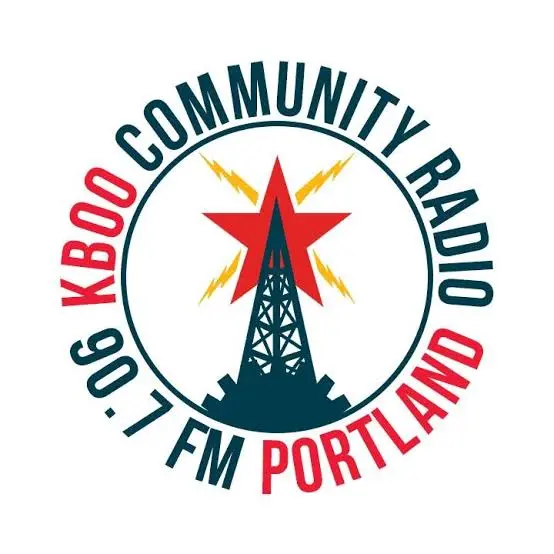 Logo for KBOO Community Radio 90.7 FM Portland, featuring a radio tower with a red star and yellow radio waves, surrounded by the station’s name in a circular text arrangement.