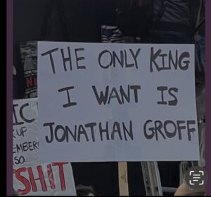 A handwritten protest sign held up at a No Kings rally in New York that reads 'The Only King I Want Is Jonathan Groff'"
